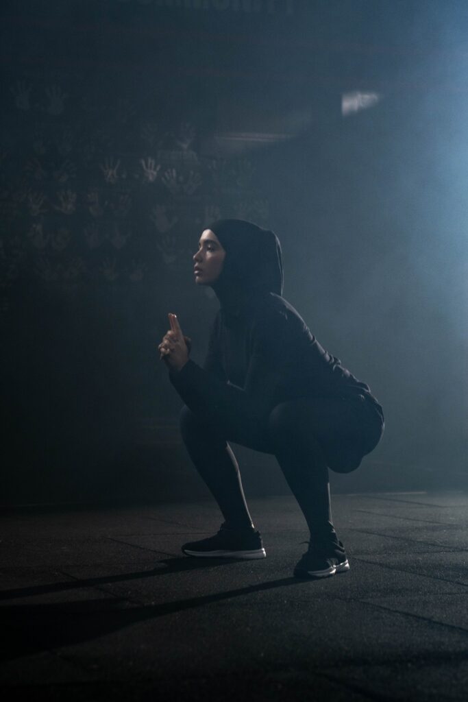 Woman doing squat bodyweight exercises